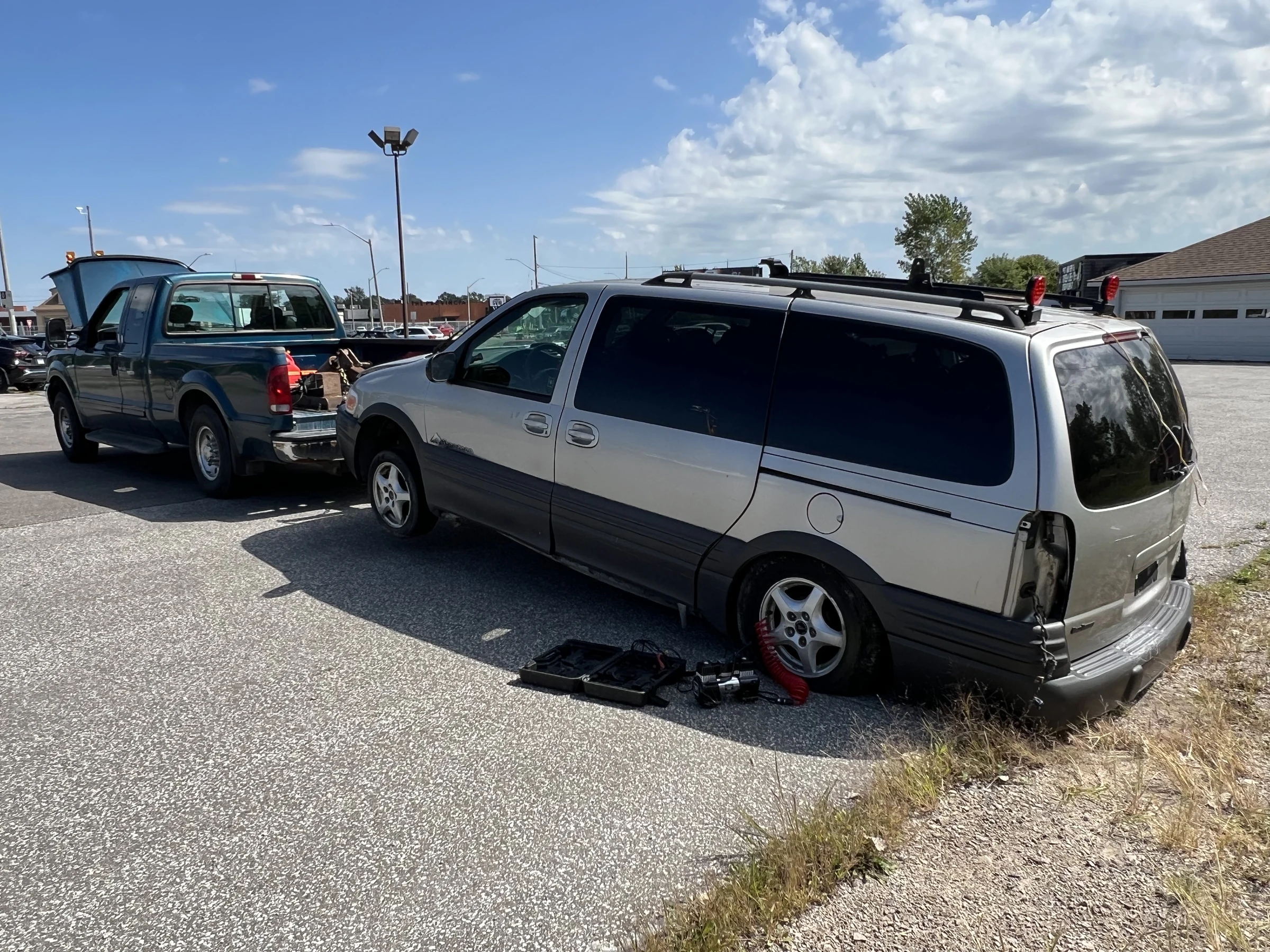 Minivan on Flatbed Trailer