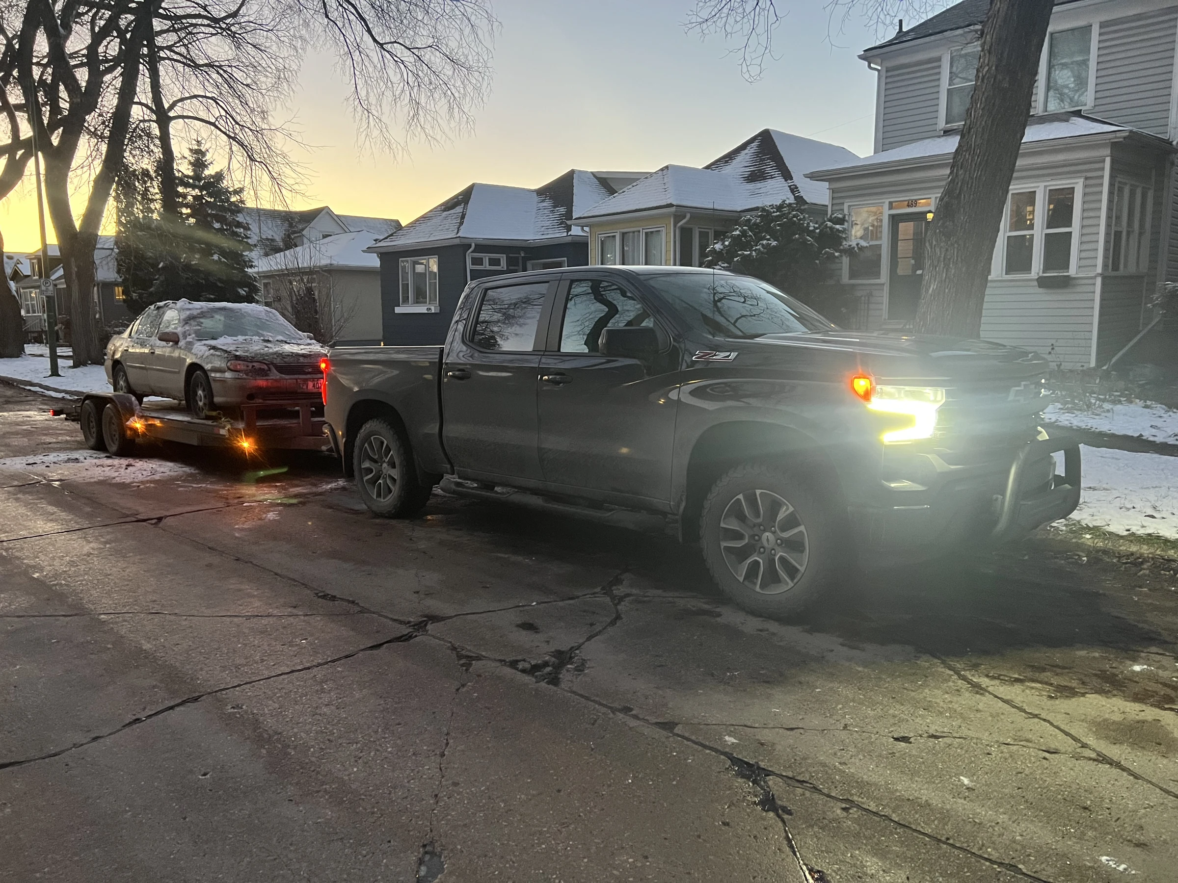 Pickup Truck with Towed Sedan