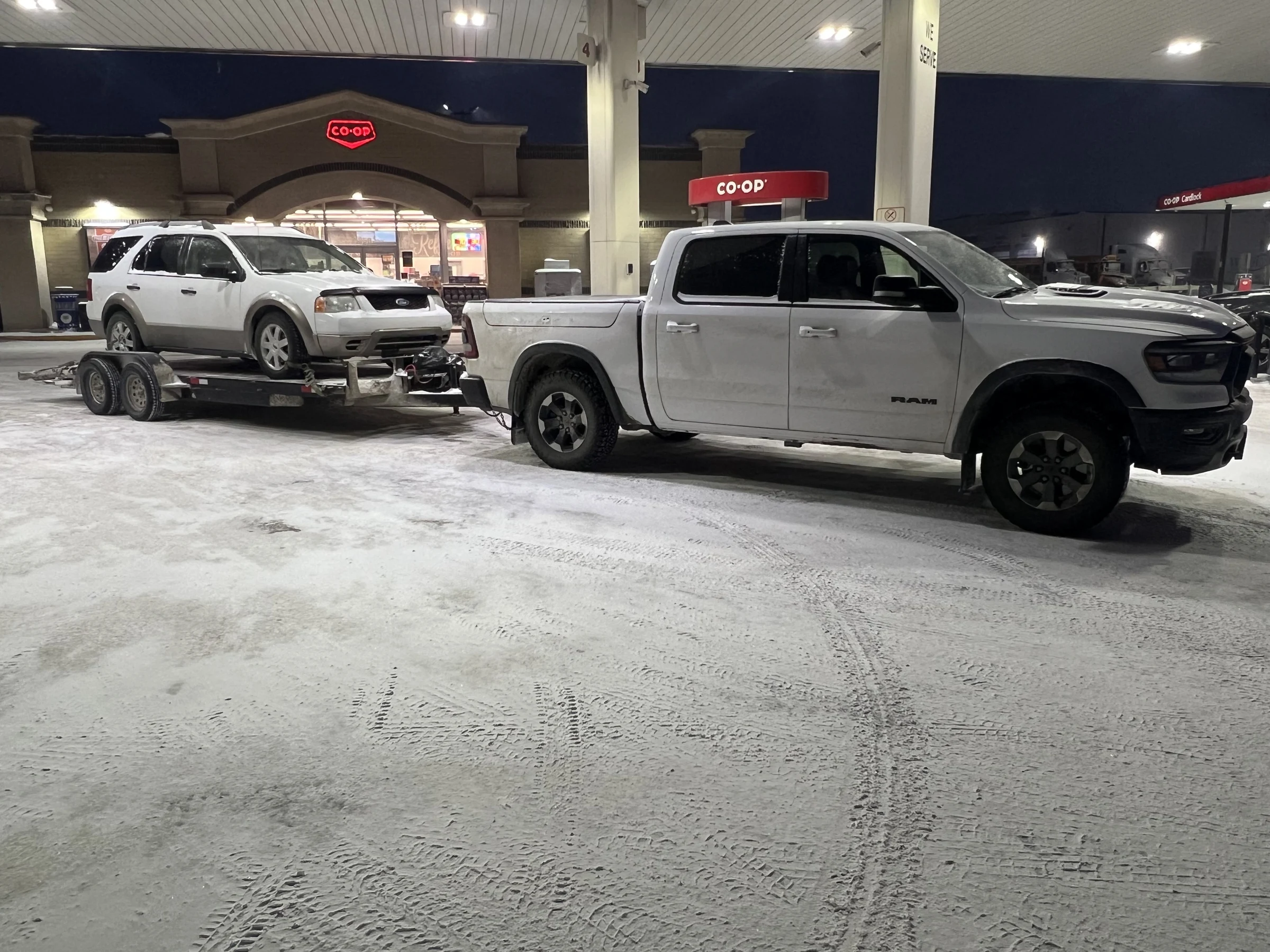 Truck with White SUV Trailer